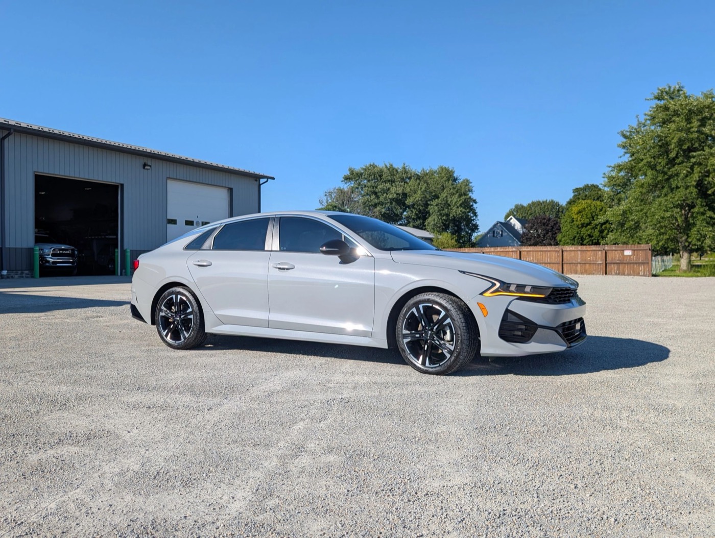 A silver Kia K5 parked outside the Signature Auto Detailing shop in Leesburg, Ohio